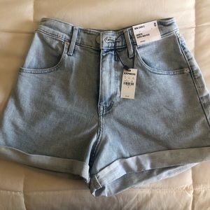 Super high waisted denim mom shorts.